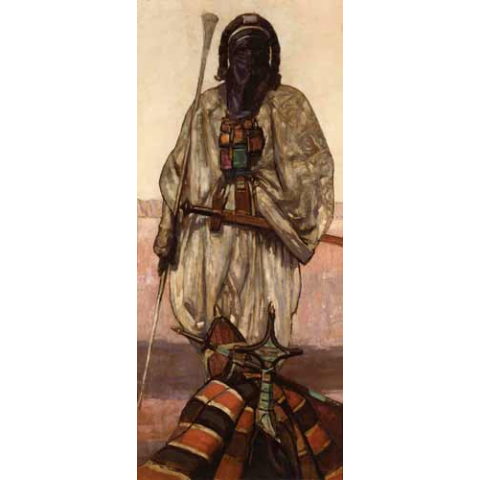 Tuareg standing and camel’s saddle
