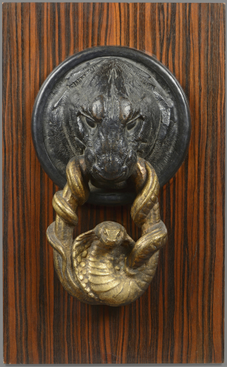 Vente par "Tajan SVV" du 21/05/2001 - Marteau de porte tête de panthère et serpent (lot n°61)