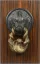 Auction by "Tajan SVV" du 21/05/2001 - Marteau de porte tête de panthère et serpent (lot n°61)